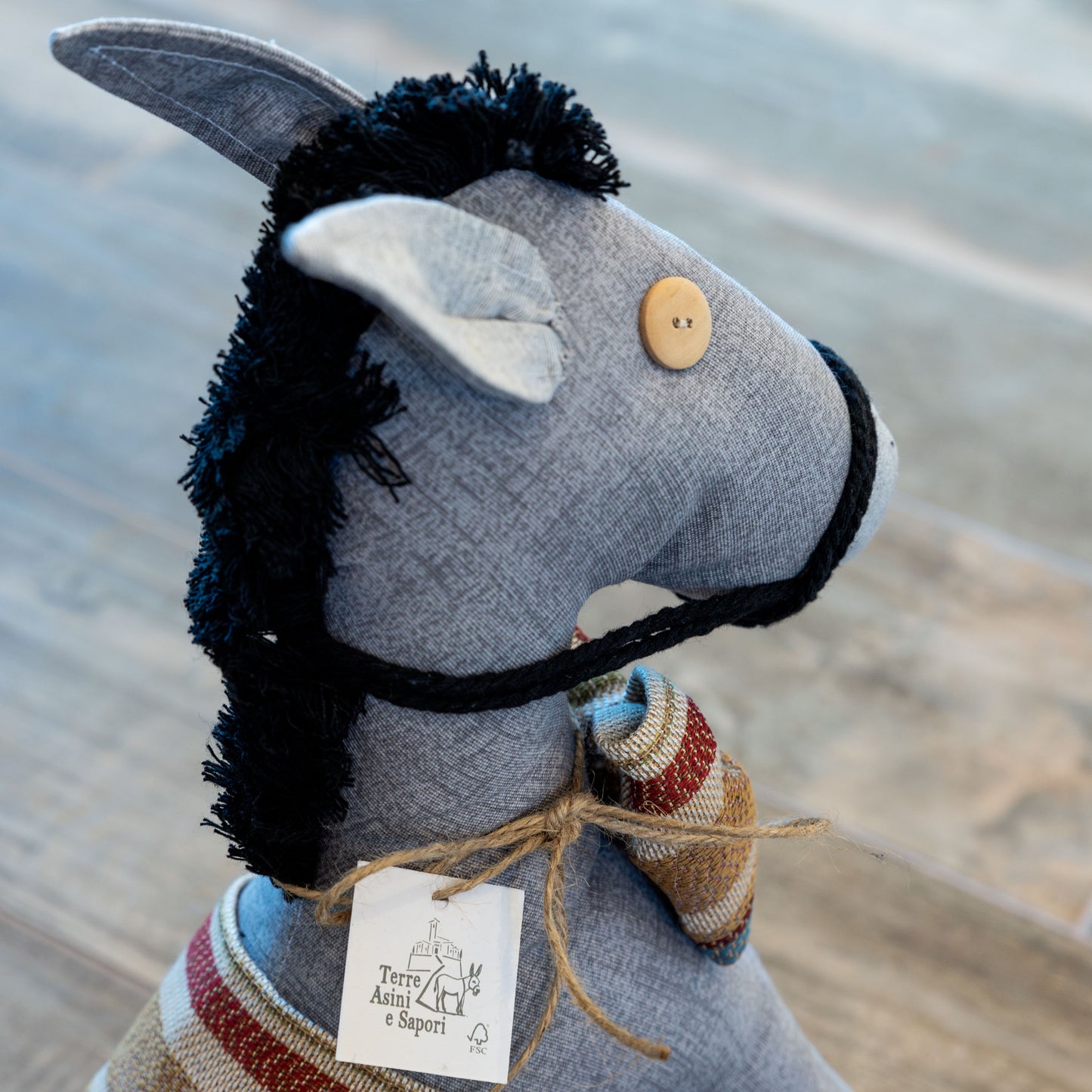 Asinello di Civita in stoffa ferma porta