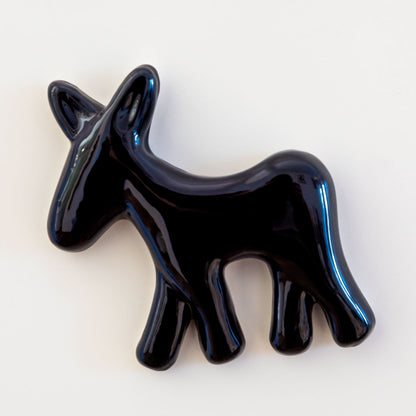 Calamita con asinello di Civita in ceramica