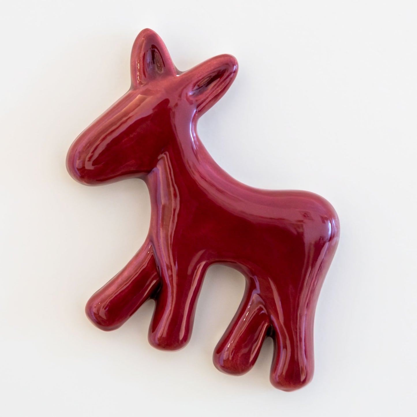 Calamita con asinello di Civita in ceramica